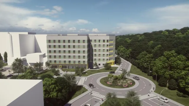 Számítógépes látványterv egy modern, több emeletes fehér és sárga színű épületről, előtte körforgalommal, zöldsávokkal és fákkal körülvéve.